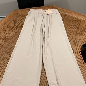 Wide leg cream trousers with pockets